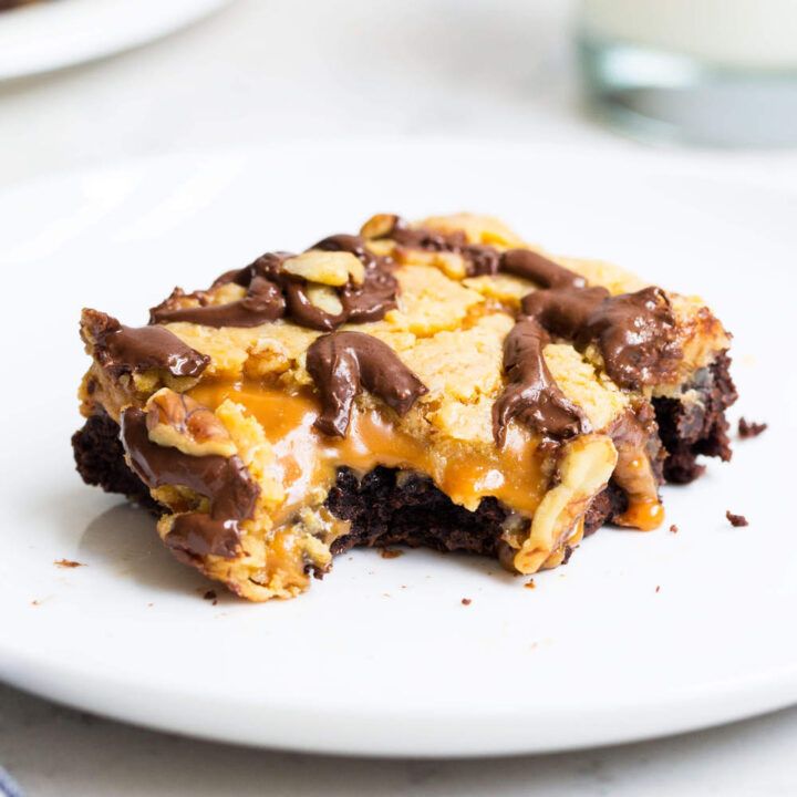 The BEST German chocolate brownies loaded with chocolate, caramel and an amazing coconut pecan frosting. Super rich and full of chocolate goodness! buff.ly/2pvpKao