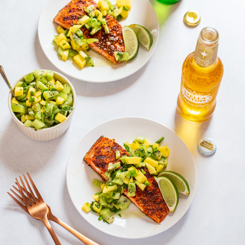 #Ad msg 4 21+ Jerk Salmon w/ Kiwi Mango Salsa is a super simple, light recipe that packs a little heat &amp; sweetness for the perfect balance! So grab friends, some <a href="/StellaArtois/">Stella Artois</a> &amp; "Your Table Is Ready!" 💚bit.ly/34h7l5U #StartWithAStellaArtois #StellaPartner #SolsticeLager