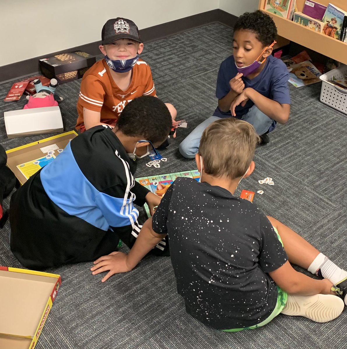 MsDant2_WLES's tweet image. Strategic minds at work! The giggling makes my day! @WillisLaneES #gamedayfun