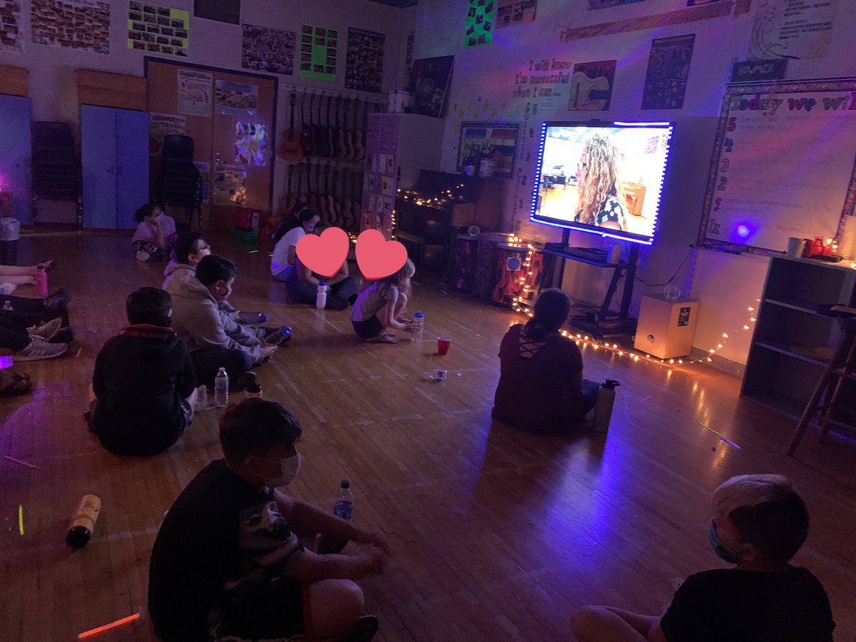 MusicBowmer's tweet photo. Since it couldn’t be in person, we made the viewing of our Virtual Variety Show as exciting as possible! Popcorn and party lights in the dark room made for some pretty excited kids! Can’t wait to be able to share live performances with kids again! #simmonspride https://t.co/tu7k9ZkDlh