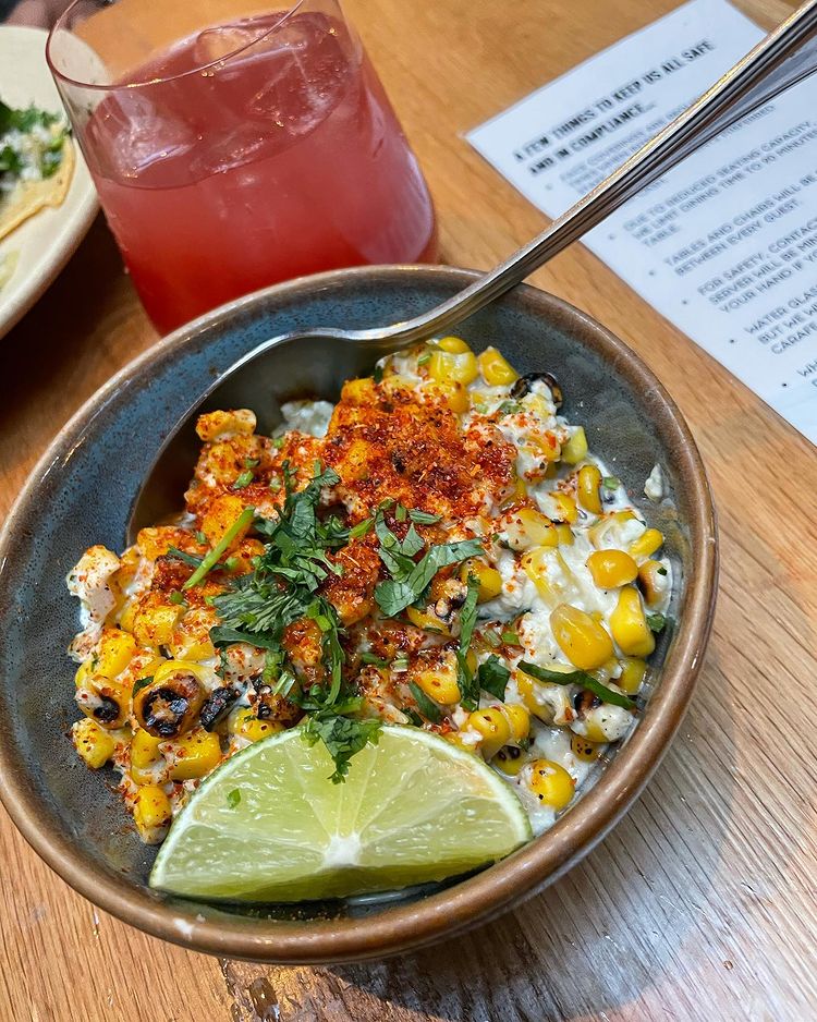 Our take on one of our favorite Mexican street foods, equite. Made with sautéed corn, crema, red onions, tomato, lime, and cotija. 🌽  🌽 
______________________
📷: <a href="/lostinthesauc/">denys</a>.e