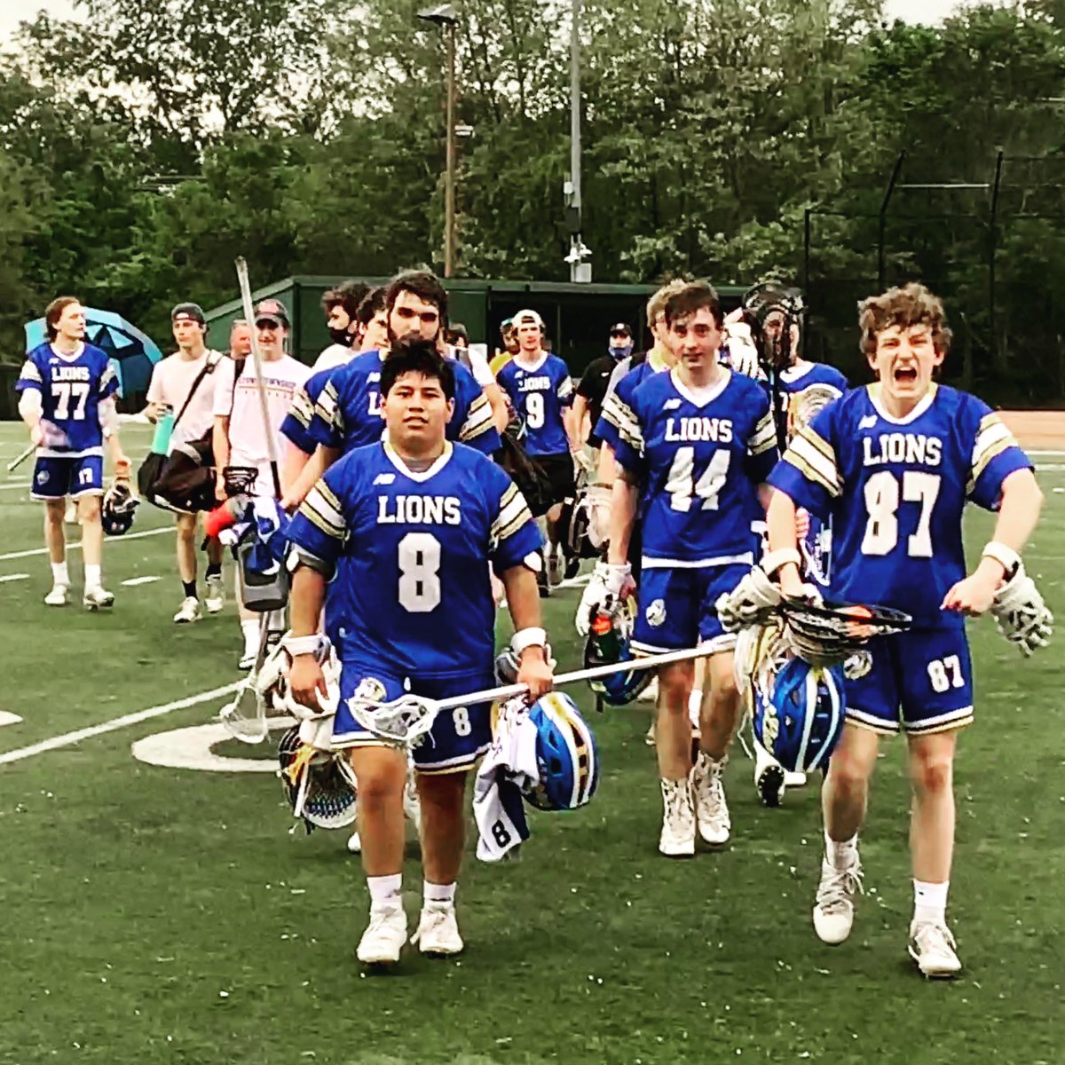 Lions leaving the field after 8-6 victory over the Hilltoppers 🦁🥍