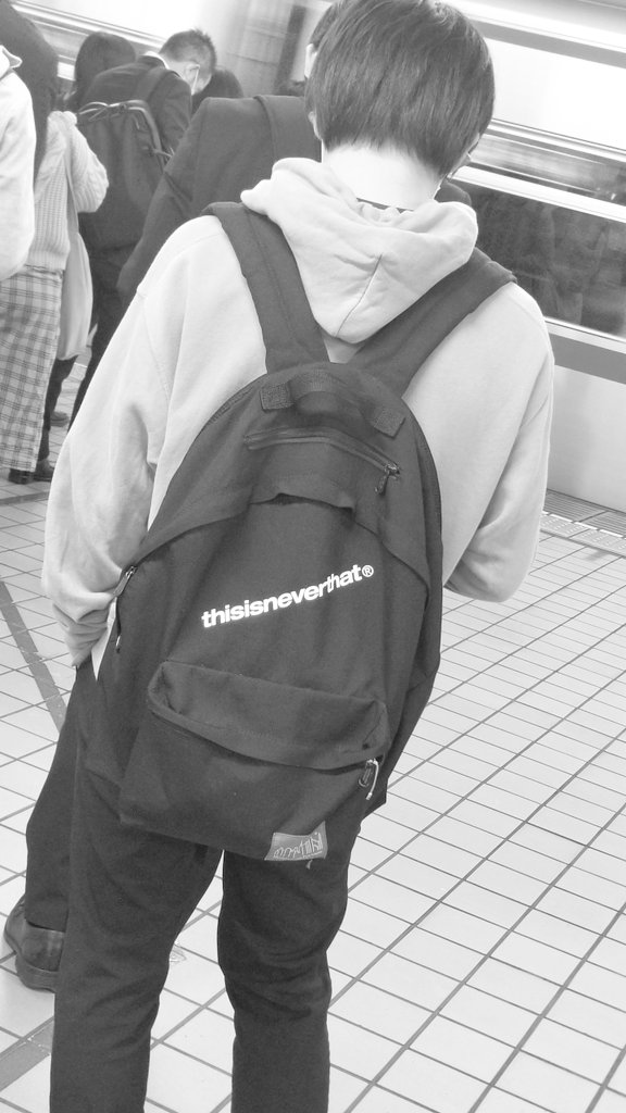 GenXGamingJapan's tweet photo. Seen this on my way to the station... Well he's not wrong :) 
"This is Never That" 
#Japan #Japanese #train #backpack #strangebutfun https://t.co/HEYCBXeRKa