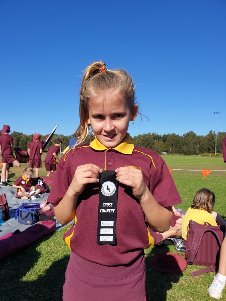 CPS runners putting in a fantastic effort at the Zone Cross Country.