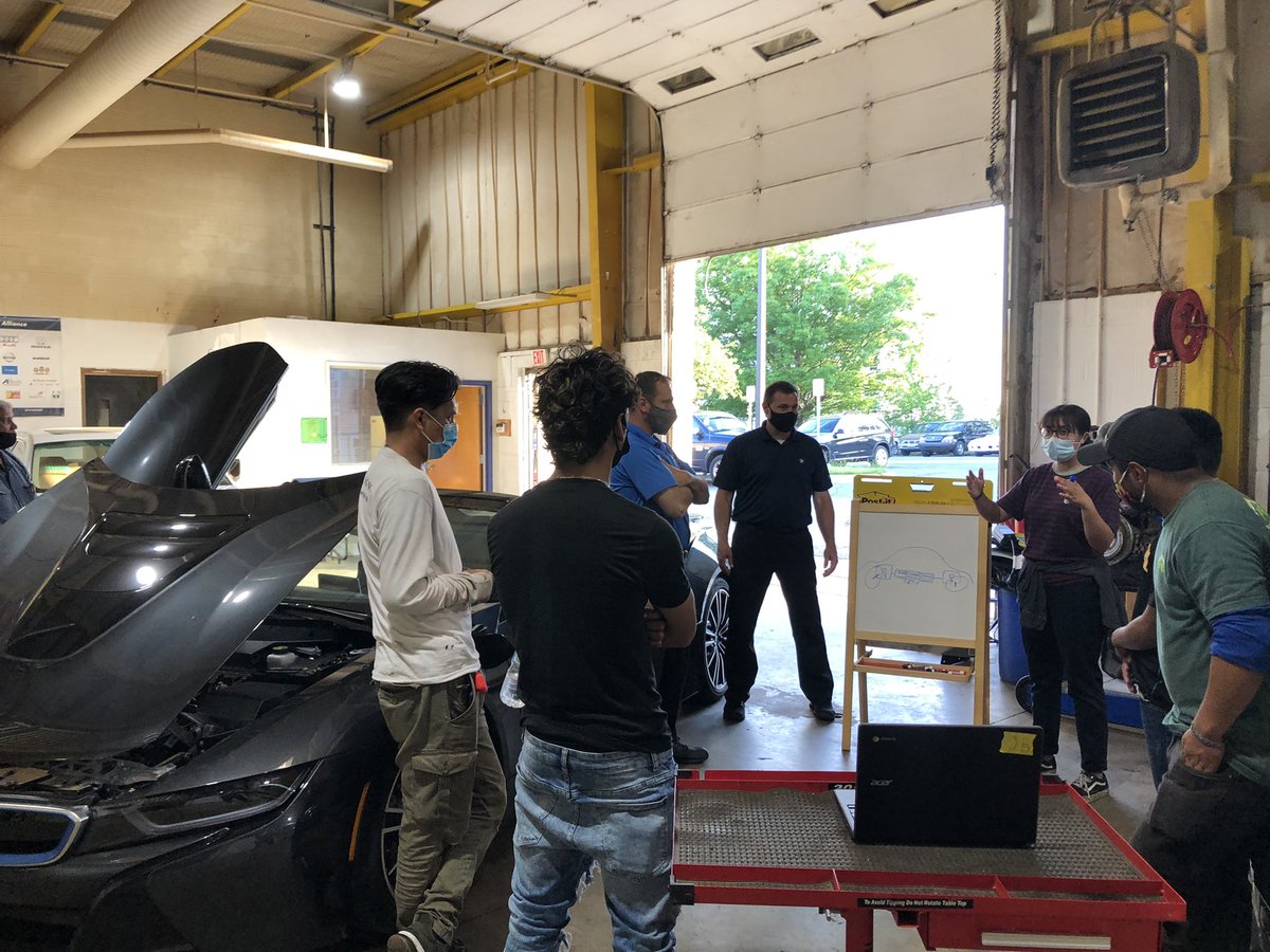 crea_mcps's tweet photo. Special thanks to #BMW for bringing the fanciest car I’ve ever seen to the #CREA evening program’s auto class tonight. Students had an interactive workshop with BMW technicians to  learn about the hybrid BMW i8 Roadster. https://t.co/dIsOan5Z6M