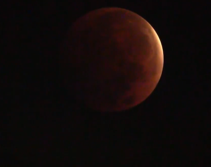 PhilippineStar's tweet photo. TOTAL LUNAR ECLIPSE ON A SUPERMOON  🌑

LOOK: Earth casts a shadow on a supermoon during total lunar eclipse on Wednesday evening. The moon reached its greatest eclipse at 7:18 PM, according to PAGASA. (Screenshots/PAGASA) https://t.co/zsFQjQNMRz