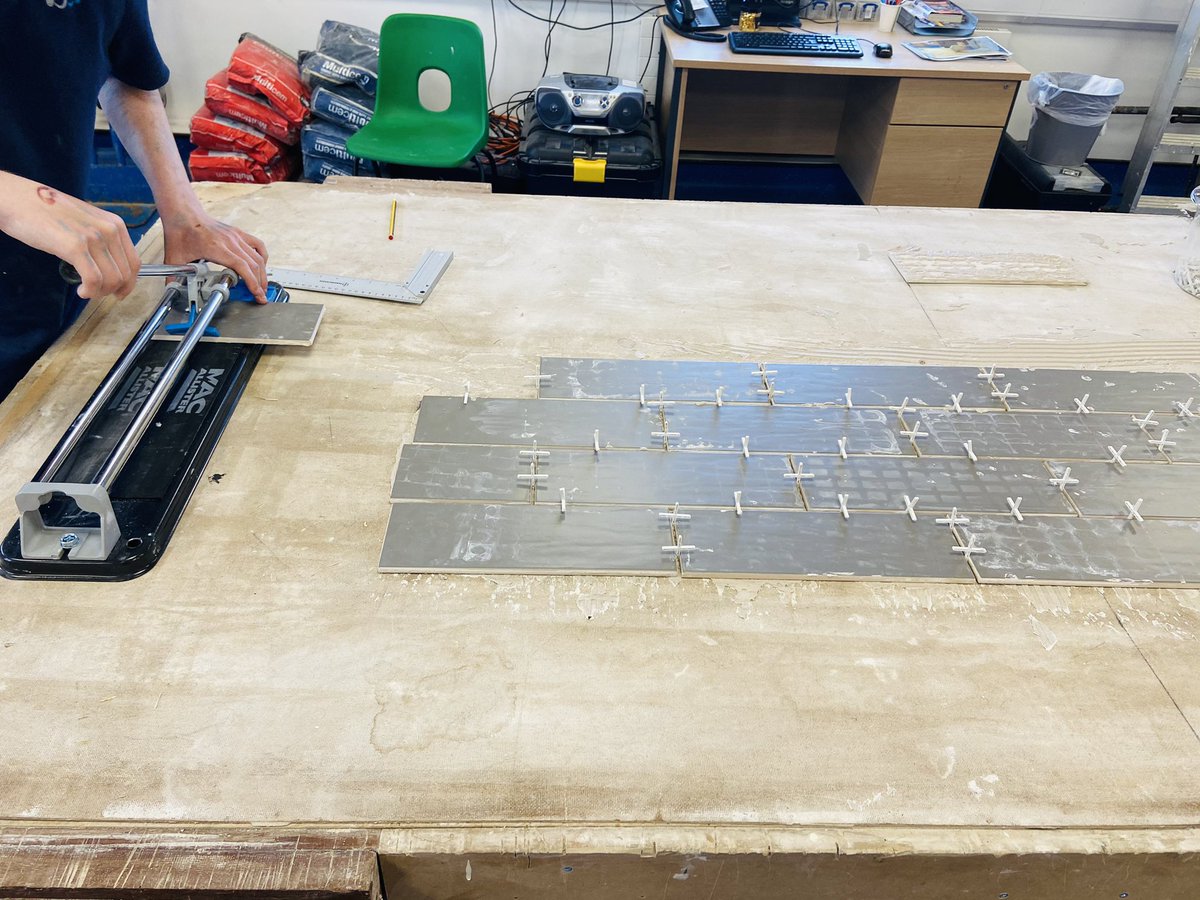 Students learning how to cut tiles this morning. #ThisIsAP