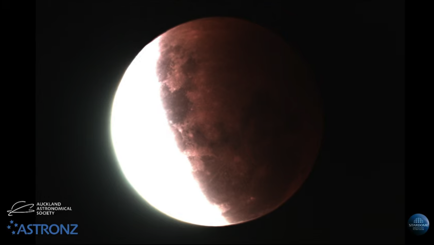 earthshakerph's tweet photo. LOOK: More than 75% of the Moon's face is now red as it gradually enters Earth's umbra! The totality of this Total Lunar Eclipse will be from 7:11 PM to 7:25 PM! #PulangBuwan2021 

📷Auckland Astronomical Society/Astronz https://t.co/UVVpsLhlBi