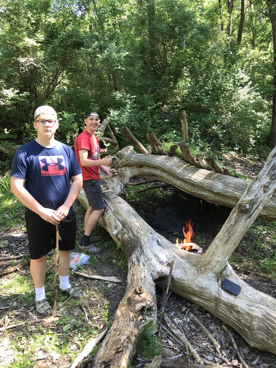 STAIndTech's tweet photo. May term students building survival shelters  as making fires at the Mitchell County Conservation Center. https://t.co/1zKE56H5bG
