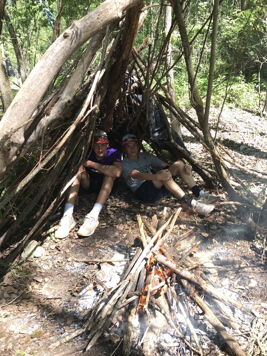 STAIndTech's tweet photo. May term students building survival shelters  as making fires at the Mitchell County Conservation Center. https://t.co/1zKE56H5bG