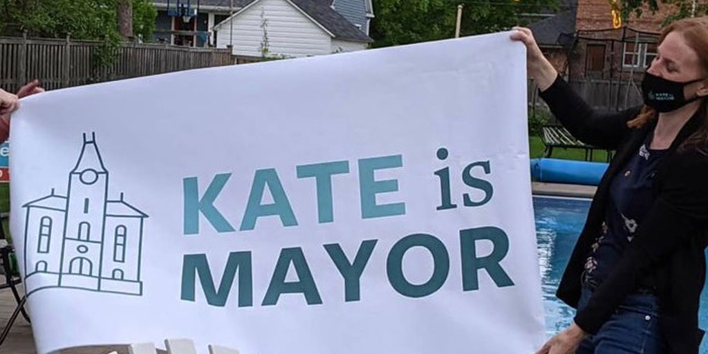 This morning I got to tell my 4yo daughter that our city has a woman mayor for the first time and that all of our hard work paid off! Unveiling this sign was a very fun moment. #DesignForChange #Fredericton @KateForMayor