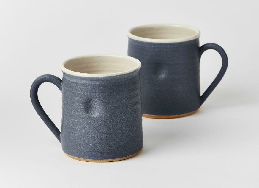 Elegant, tactile Stoneware Mugs by Tone von Krogh on their way today - Tone's forms are inspired by memories of Norway, soft curves and sweeping shapes evoking snow covered landscape, where the original shape of the object beneath is almost unrecognisable. madebyhandonline.com/collections/to…
