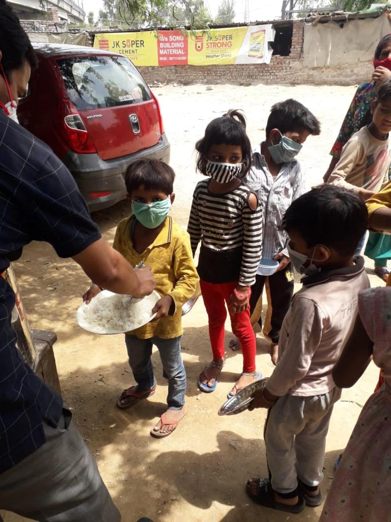 DrRadhikaBatra's tweet photo. Amidst the devastation created by Covid-19 across the country, manager at Every Infant Matters, Umed Singh, goes to distribute food in Delhi’s slums to hungry, homeless women and children; for nothing can put a brake on the Million Meals project. #everyinfantmatters https://t.co/c5OvswT1he