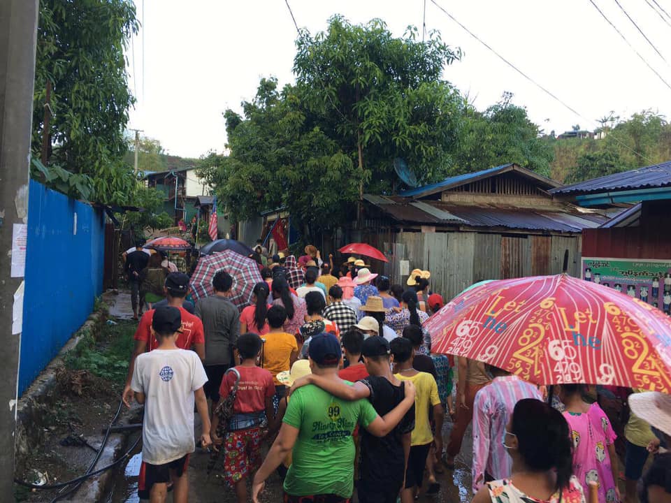 Myanmar_Now_Eng's tweet photo. Despite a heavy downpour, opponents of Myanmar's military dictatorship in the jade mining town of Hpakant in Kachin State in the north came out to protest this evening (May 26). 

Photo: CJ

#WhatsHappeningInMyanmar https://t.co/DWhfLmlvs4