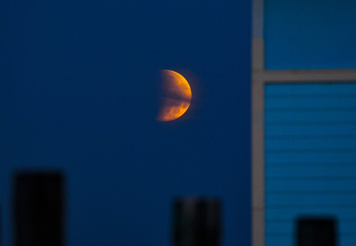 USATODAY's tweet photo. Sky watchers in some parts of the country witnessed one of the greatest sky spectacles of the year Wednesday morning as a full moon, supermoon and lunar eclipse happened at the same time, creating the super flower blood moon.

📷: AP, Getty Images, Florida Today https://t.co/cEDnZzJP5f