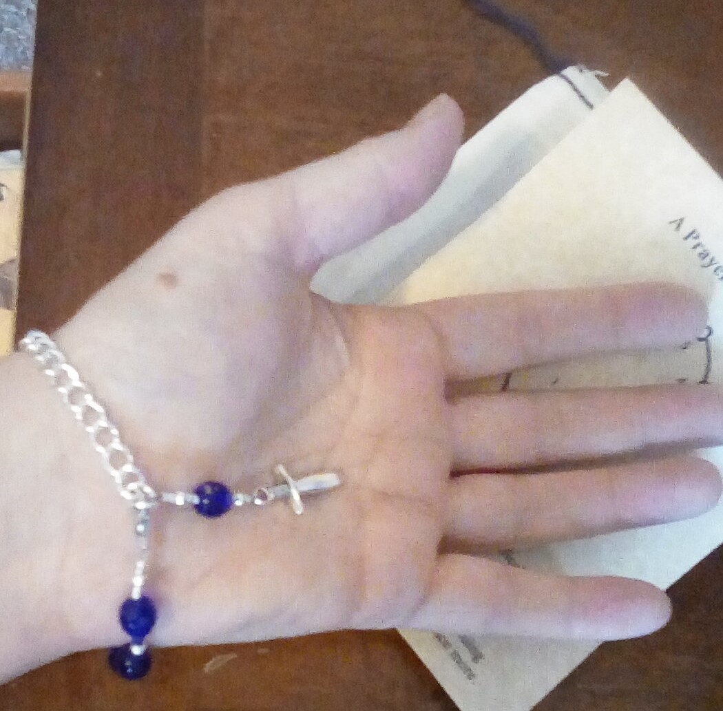 Skadisdottir1's tweet photo. Admiring the lovely handiwork of a new already beloved Tyr prayer bracelet by @hearthinhand and thankful for #polytheist artists and crafters offering their work to the community. #gratitude #heathenvisibility #supportcrafters #supportartists https://t.co/L1bh6Uv7pi