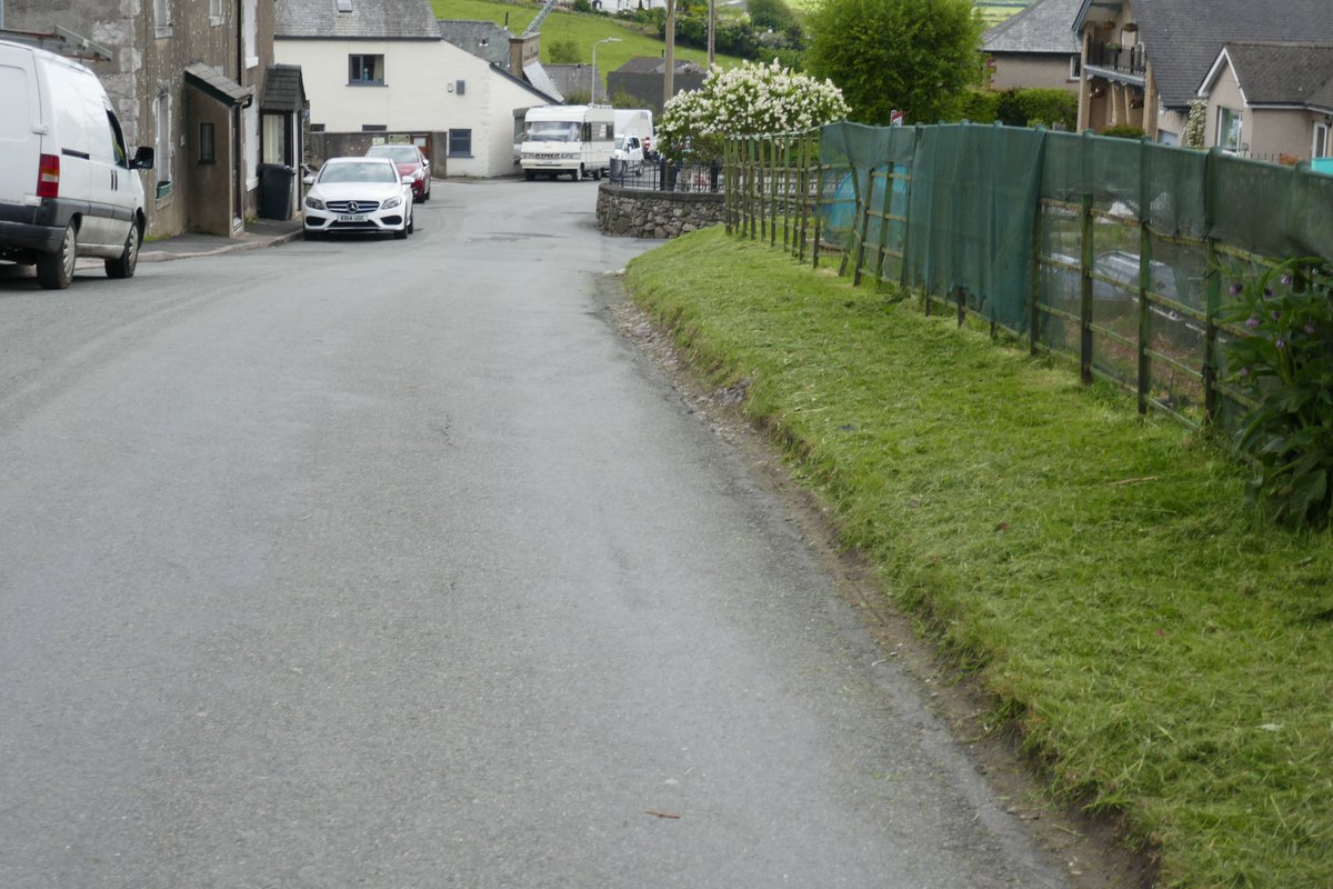 TheLengthsman's tweet photo. For once this week it wasn't #raining so put a hard shift in at #Allithwaite strimming the village verges ~ love the kids hanging over the park wall "wot's your name mister" and I get nice #waves from the Mothers ! https://t.co/C5LdNInvMG