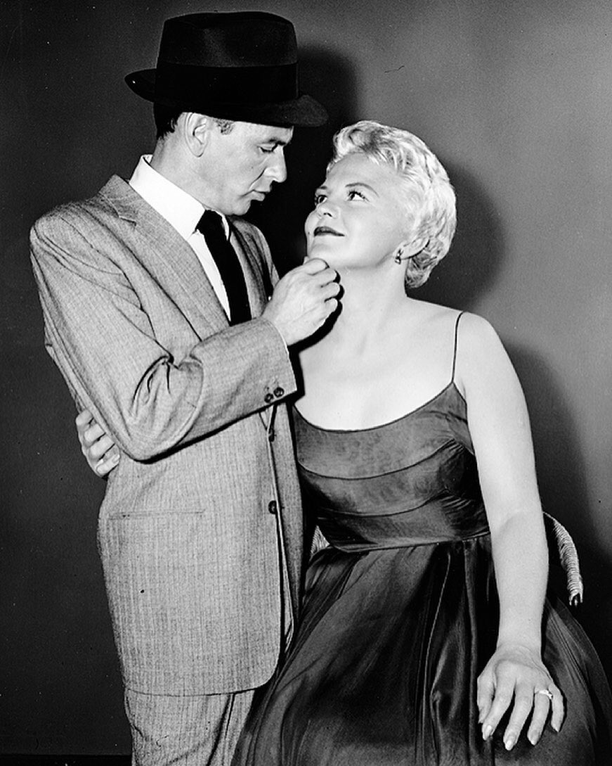 TheGlamourGuy's tweet photo. her disillusioned delivery. She made the song her own but the co-writers were Jerry Leiber and Mike Stoller, the same guys responsible for the gay love song “Jailhouse Rock.” Frank Sinatra looks like a patronizing prick in this pic but I’d argue Lee was the superior song stylist. https://t.co/ptFeprRdgr