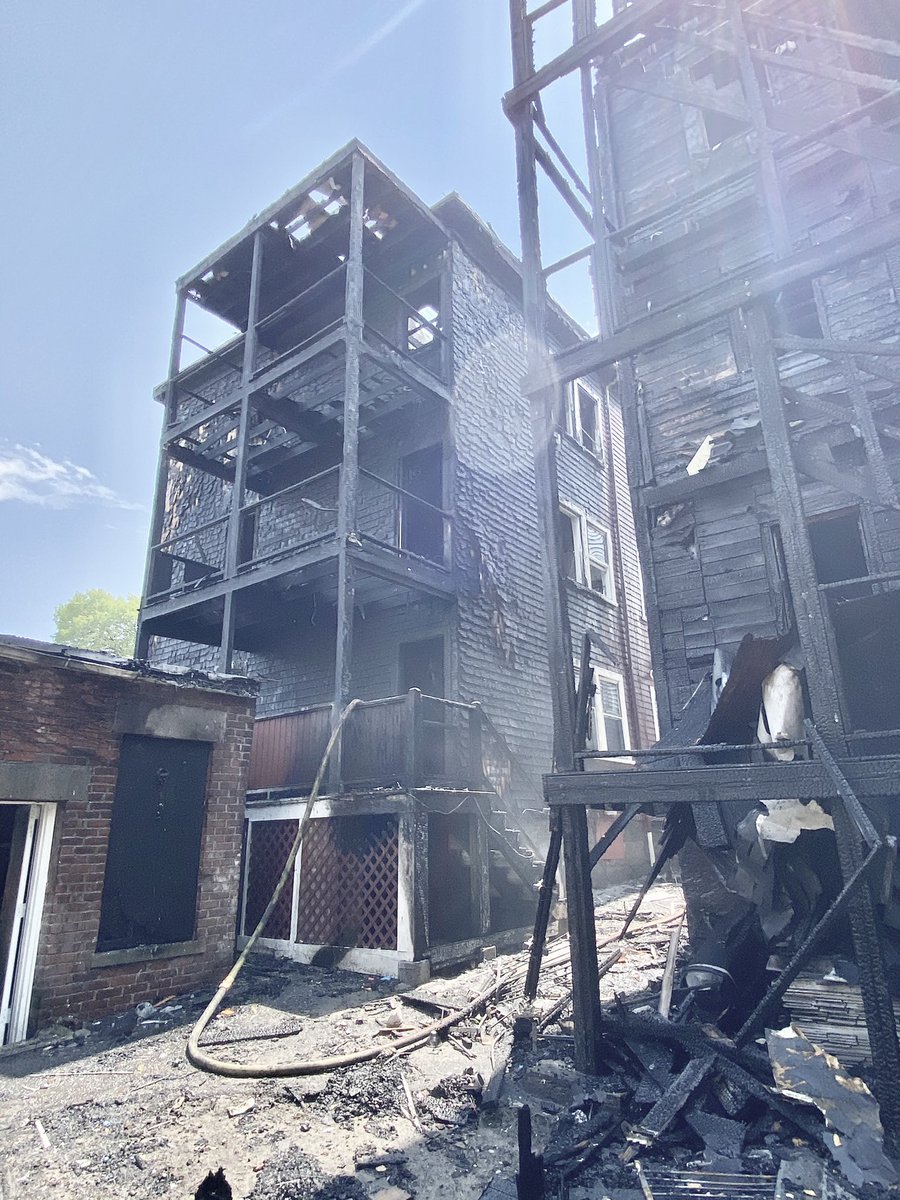 BostonFire's tweet photo. Pictures of the extensive  damages to the rear of the 3 fire buildings on Fayston St. https://t.co/Nehe1kQAcp
