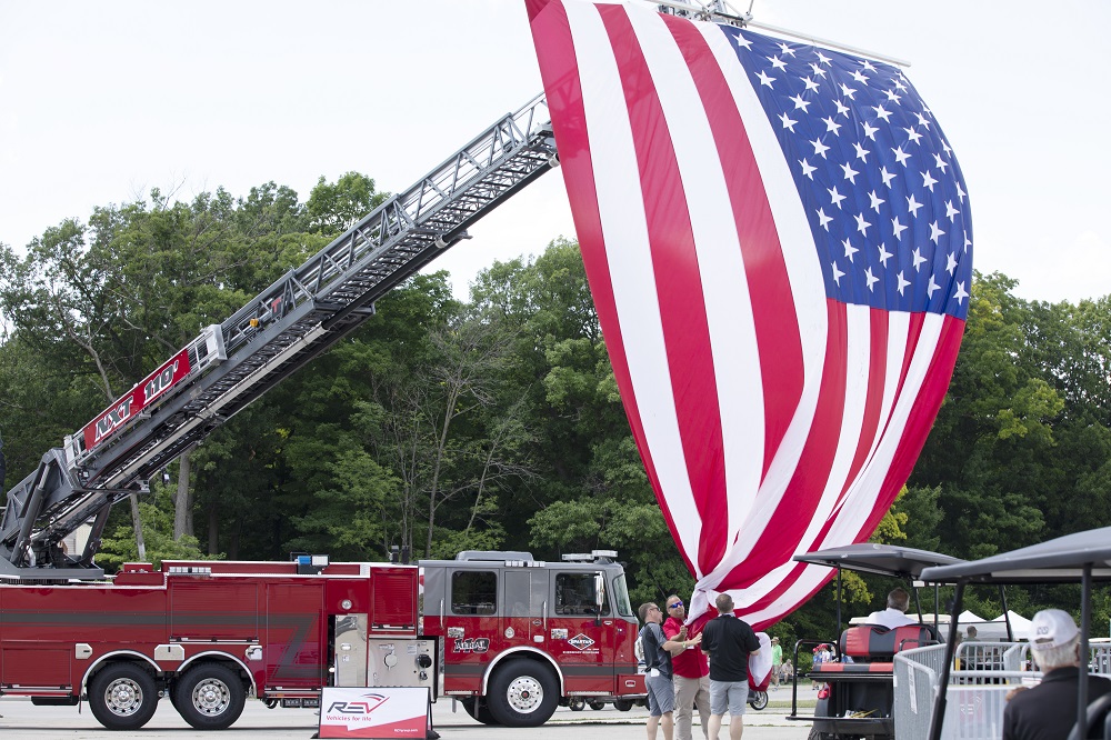 revgroupinc's tweet photo. Here's our team setting up the REV Group Fire & Emergency Vehicle Showcase at Road America in 2020. If you're planning to attend the race June 17-20, stop by - just look for the amazing Stars and Stripes and our Aerial Ladder!
#REVGroupGrandPrix #Thankyou #FirstResponders https://t.co/7pIBlImjkK