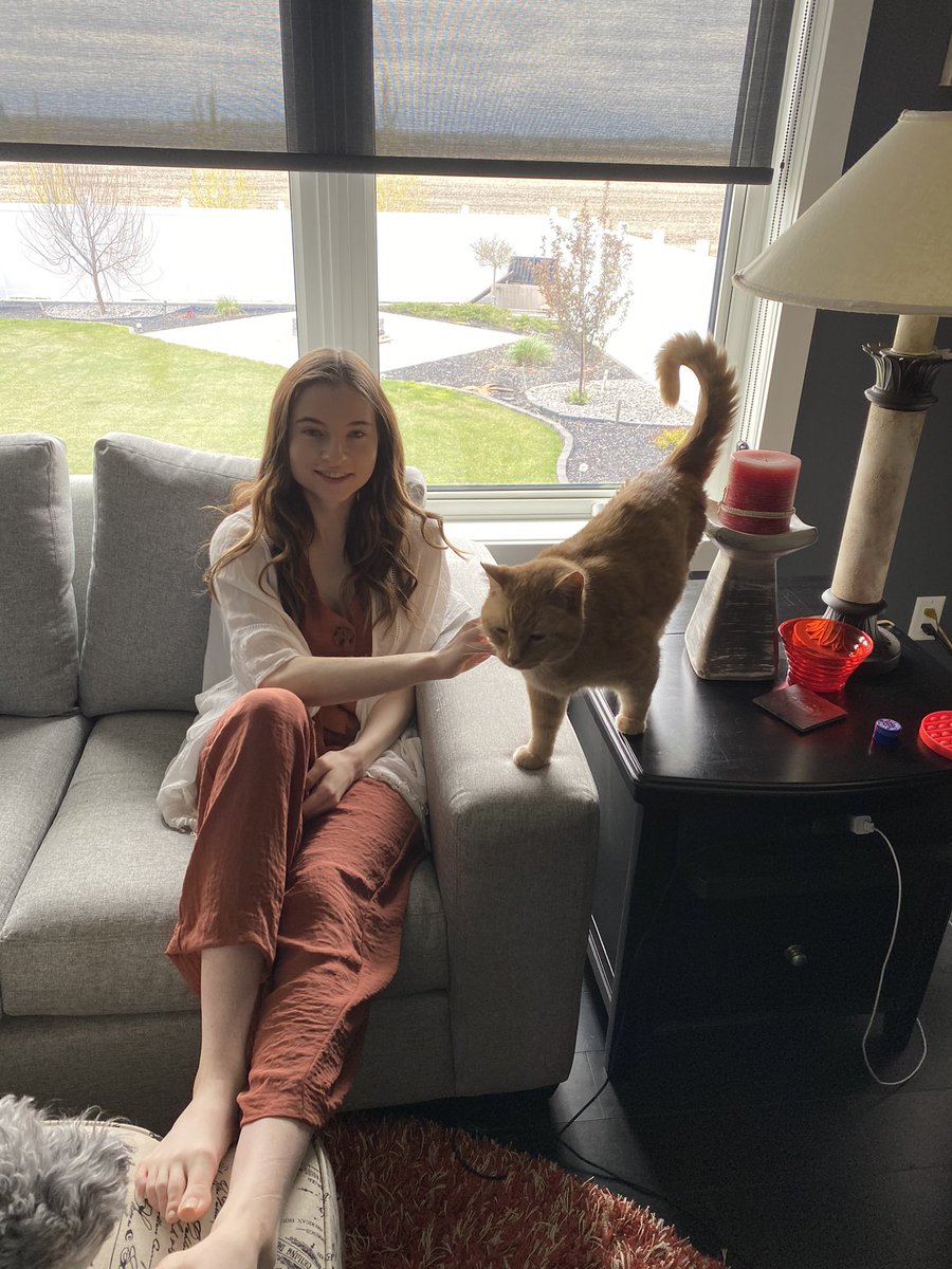 K_Phair's tweet photo. Happy 19th birthday to my youngest. She is the one in the orange. Not the cat - the other one. I don’t know when the cat’s birthday is. Have fun studying rocks today Abby - or doing whatever exciting things you have planned. https://t.co/fWnYzzKhk1