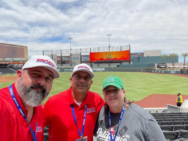 HSLsoftball's tweet photo. HSL member/NAGAAA treasurer Tim Clancy and HSL member/ASANA Commissioner Angela “Butter Bean” Smith are in Las Vegas this week representing the leagues at Connect Sports diversity summit. They are shown with NAGAAA Commissioner John Deffee. Thanks to both for representing us. https://t.co/MIj9oKjJWl
