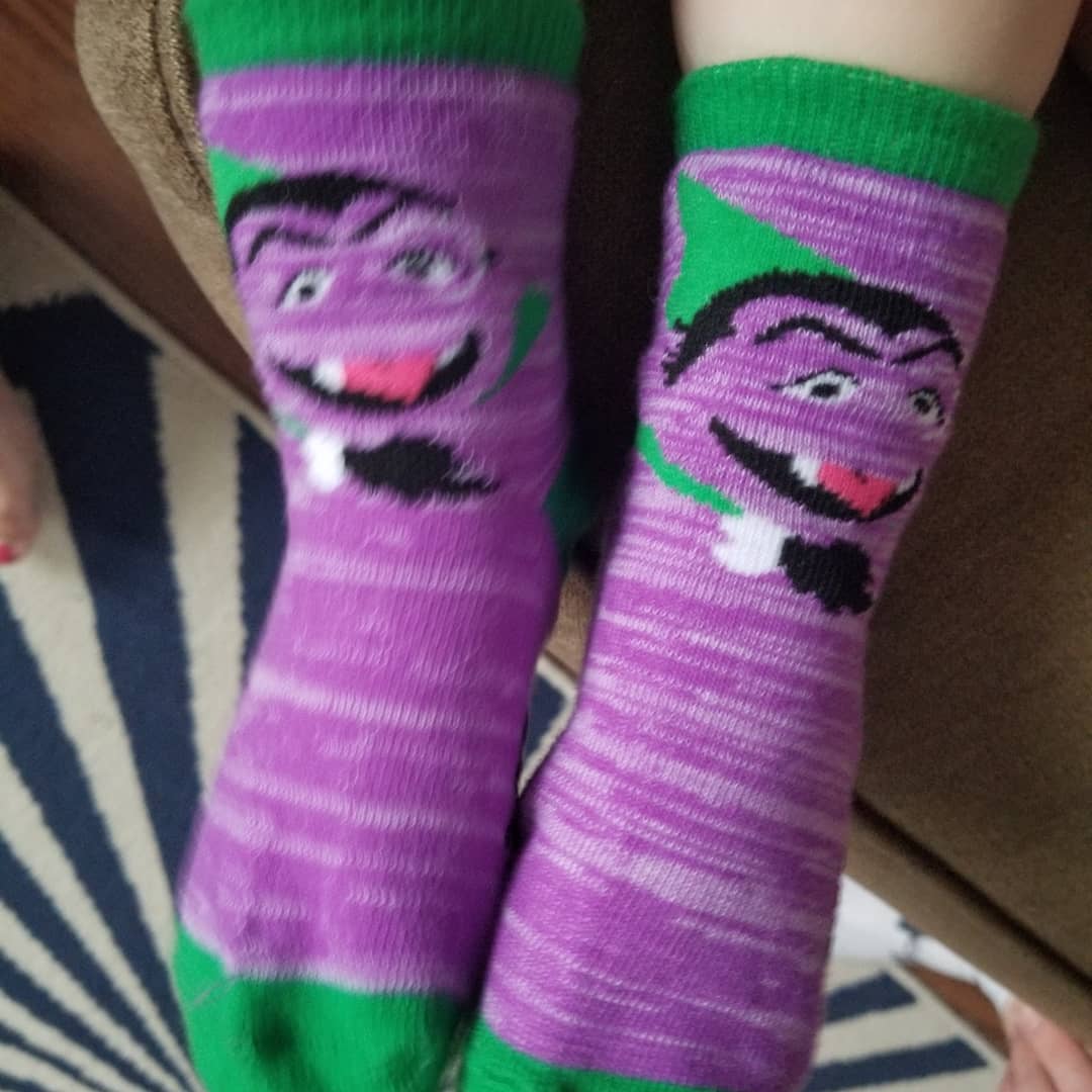 hduttonmath's tweet image. Having two math teachers as parents may lead to your 2 year old choosing the Count socks! @sesamestreet @_JasonDutton @CountVonCount #ilovemath