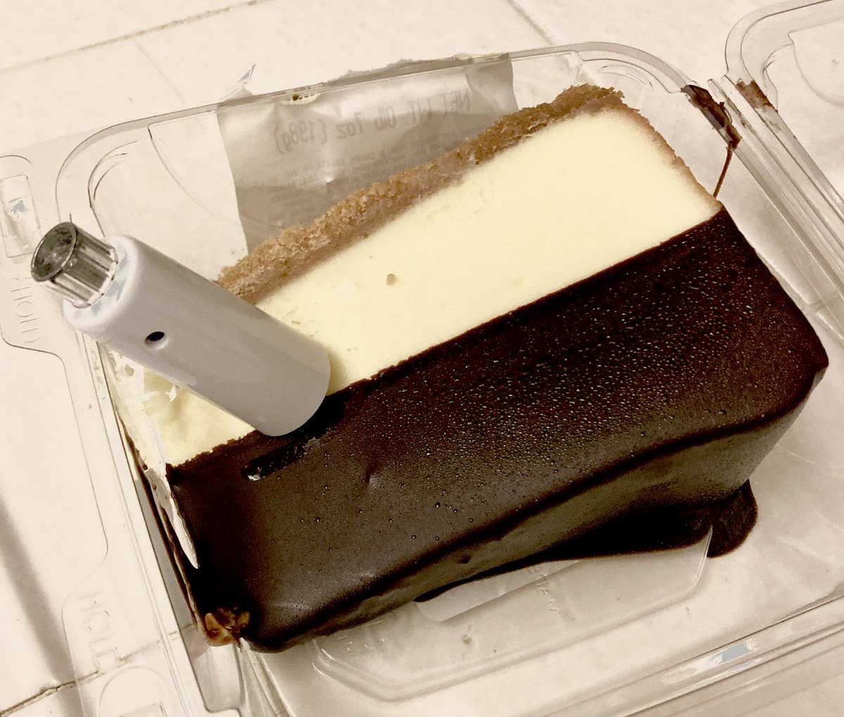 balefirebex's tweet photo. A bit of halvsies of “sin on a stick”, and despite the strange pocketbomb looking thing, it actually does a shrill piercing melody of Happy Birthday. So, yay! Cheesecake &amp; not death! Leveling up to 39, but last year shouldn’t count. Life = good. Not great, but who am I to argue. https://t.co/CJzFFS4PhW