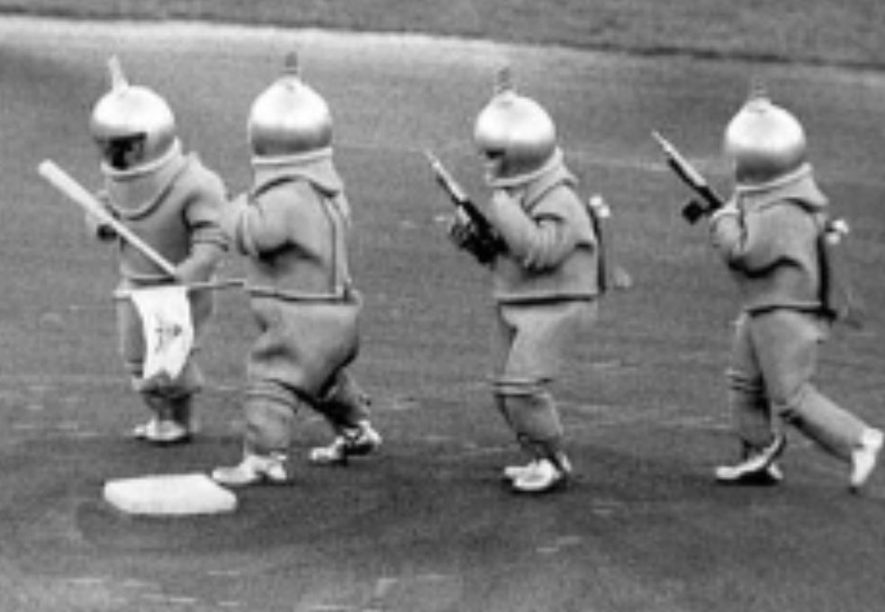 Today in 1959 @ Chicago’s Comiskey Park, owner/showman Bill Veeck's newest stunt featured 3-feet/7-inch Eddie Gaedel w/3 others of near height arriving by helicopter dressed as Martians w/toy ray guns greeting White Sox players Nellie Fox &amp; Luis Aparicio @ 2nd base. <a href="/LukeEpplin/">Luke Epplin</a>