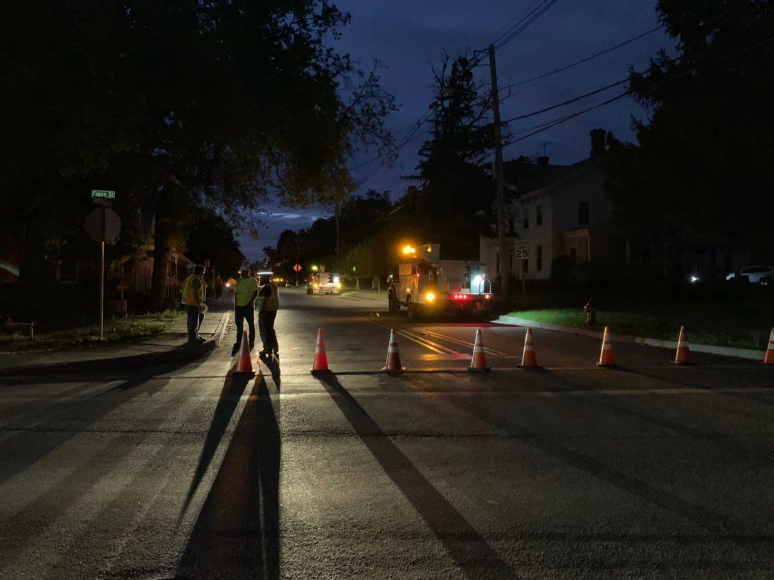 Here's the big tree that came down, taking power lines with it, across from the Middlebury Inn this afternoon (pic by Steve James). Power is still out for many in Middlebury. Brian Cadoret took the other pic of crews still working to fix the outage on S. Pleasant St. tonight.