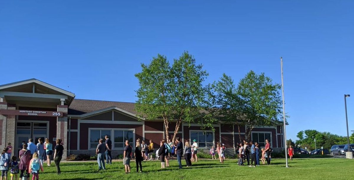 HeritageNL's tweet image. Worship Wednesday! On this last Wednesday of the school year, our staff held our morning prayer/worship on the front lawn as students and families arrived. It was good to gather and give thanks for all God has blessed us with this year. #HCSTransform