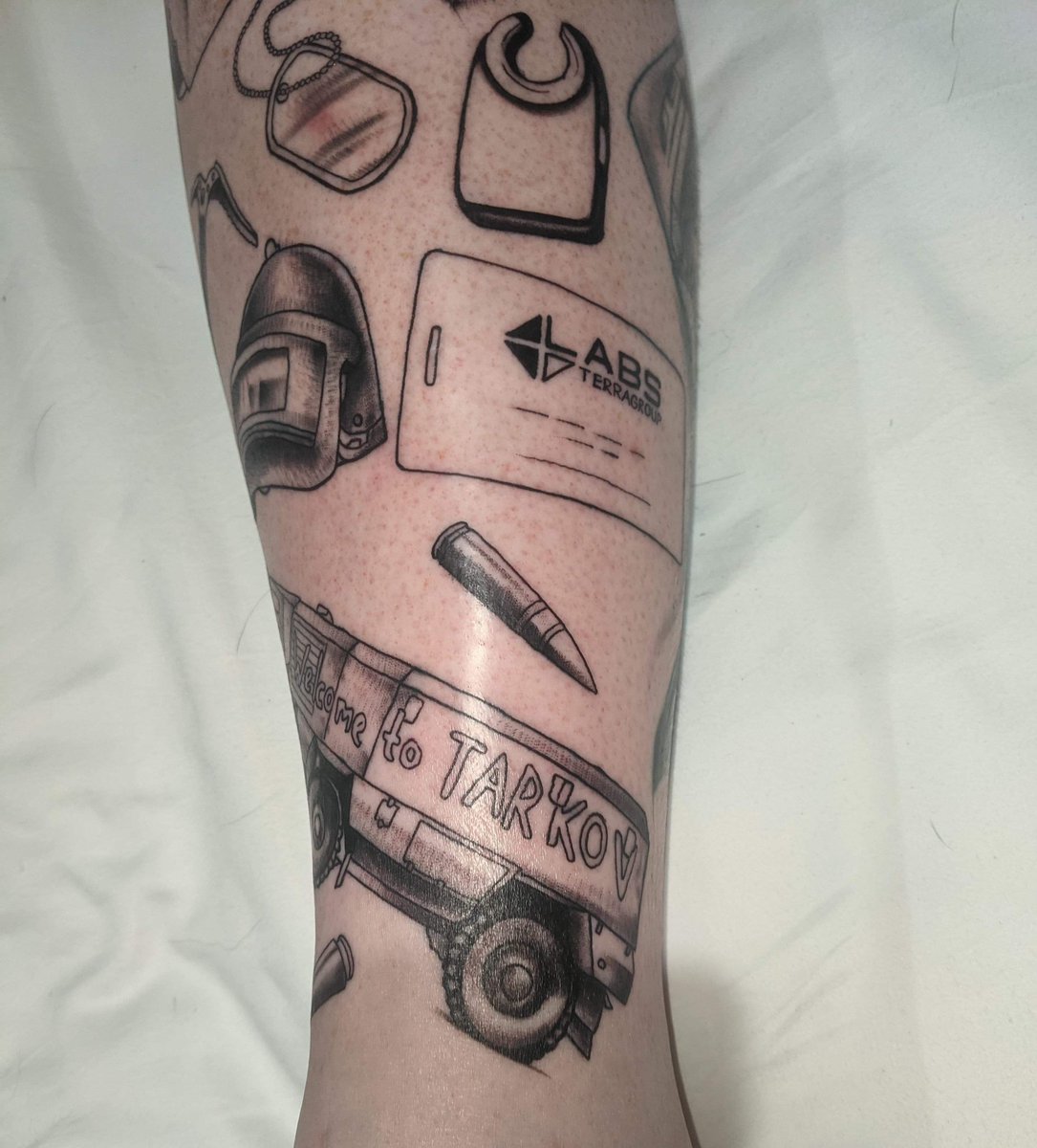 RedOpz on X: "Holy I'm in love with these tattoos Super happy with how these turned out! Whole shin dedicated to Tarkov! @bstategames #EscapefromTarkov https://t.co/c2FOGakFFM" / X