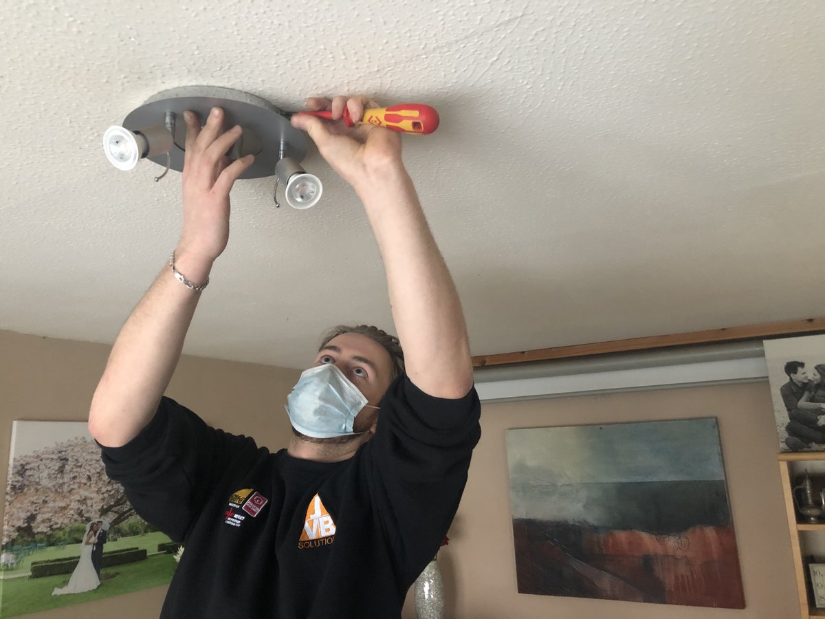 JVBSolutions's tweet photo. JVB Solutions has a team of qualified electricians that can assist with checking the electrics of any commercial or domestic house or building, providing an EICR of as little as £145+VAT.

Just like our engineer Charlie here, who is changing a client's light in Claygate. https://t.co/RpRyA2RUAB
