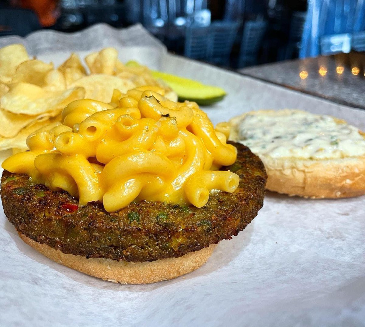 theshiftbeer's tweet photo. 🍔National Burger Month Special - Week 4🍺

Bacon Mac Burger:
1/2# burger patty - topped with Gouda Mac &amp; cheese, crispy bacon strips, &amp; jalapeño aioli on toasted buns... with side of Gold N Krisp Potato Chips &amp; a pickle spear. $9.50

Sub in a vegan burger at no extra charge! https://t.co/2RWssIeXlQ
