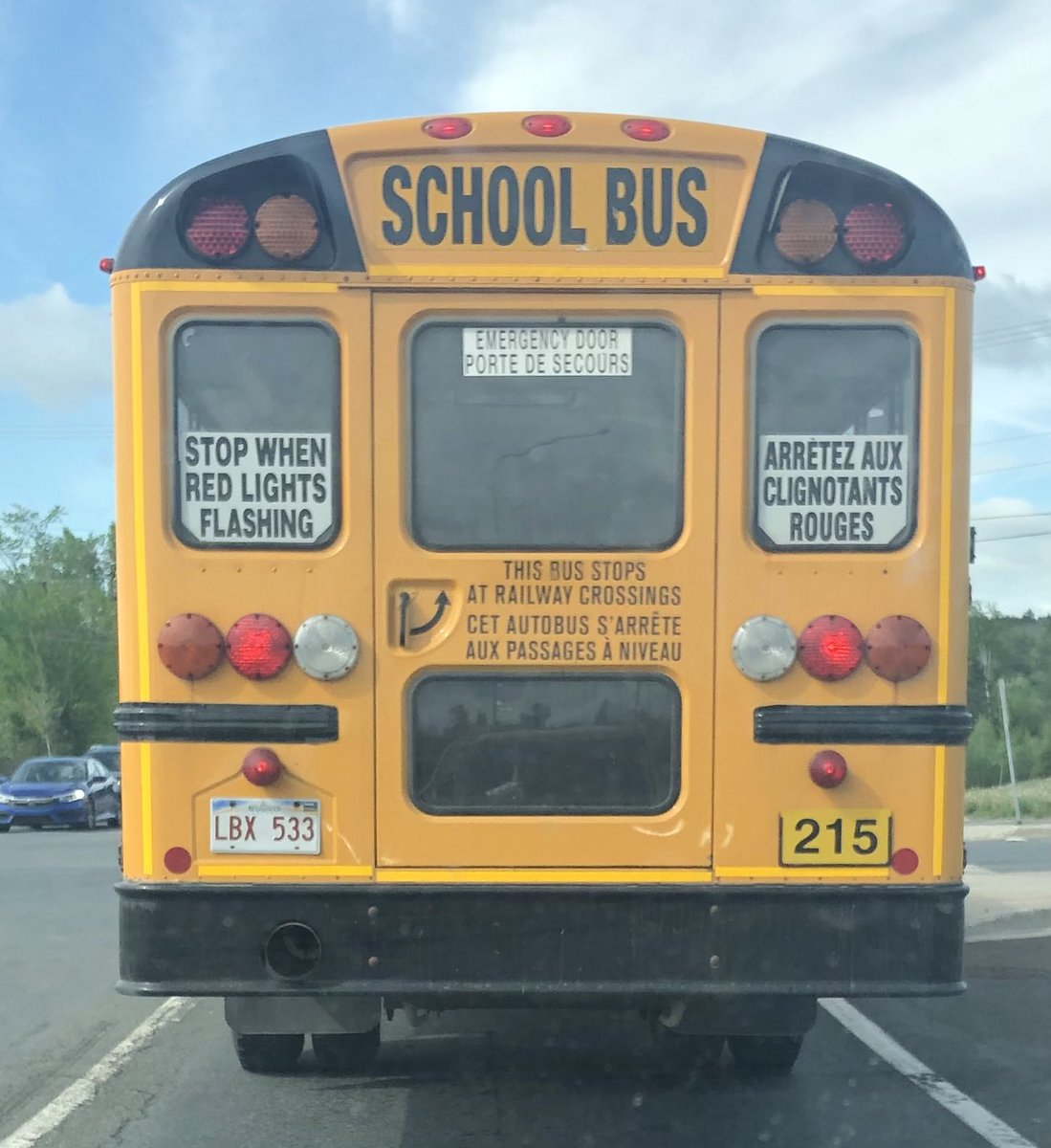 aaroncushing's tweet photo. @fton_drivers @CityFredPolice This school bus full of kids just blew through a red light at Kimble/Canterbury/Whetmore on its way to Grant Harvey. (I’m stopped @ intersection for pic &amp; safely parked to post!) https://t.co/2fRyppRVWI