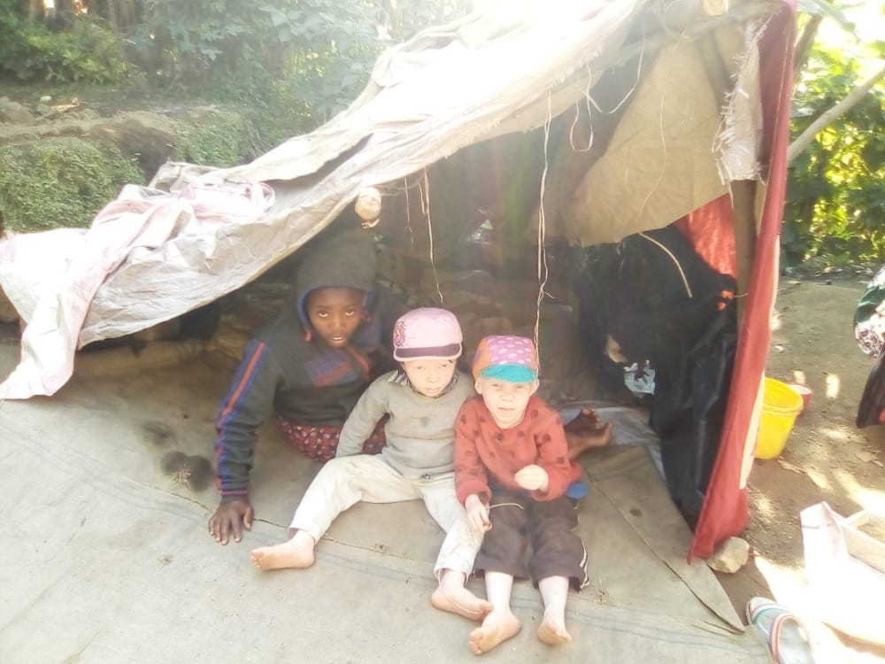 This is Olive the mother of Fiona and Celine from Rubavu. Her small house was destroyed by earthquake they spent the night in this tent made by Olive,afraid of illness, the robbery of her children,she need a safe shelter and emergency first aid for the children.<a href="/LindseyJulianna/">Julianna Lindsey</a>
