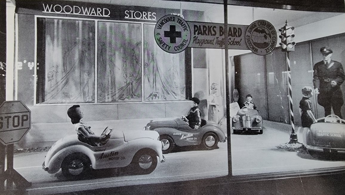 #TBT - 1952 - storefront advertisement at the old #Woodwards store at Hastings & Abbott for the @ParkBoard & #VPD 'Playground Traffic School' for kids @VPDYouth @VancouverPD