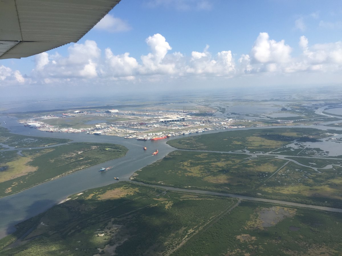 AlexSKolker's tweet photo. State of the Coast 2021: Coasts ports are an important part of the world economy, and also, by nature close to sea level. This photo is of Louisiana's Port Fourchon, and is a reminder of the intense amount of #infrastructure we have near the water. #soc201 https://t.co/jbVxMOH17J