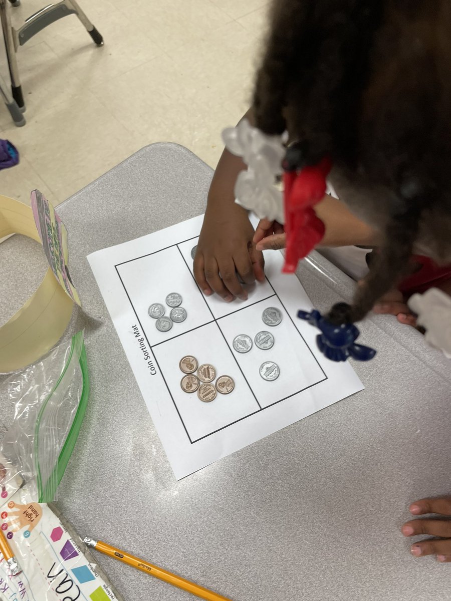 MsWagner14's tweet photo. Kinder was working really hard to sort coins in different ways. https://t.co/gCZRWoNit6