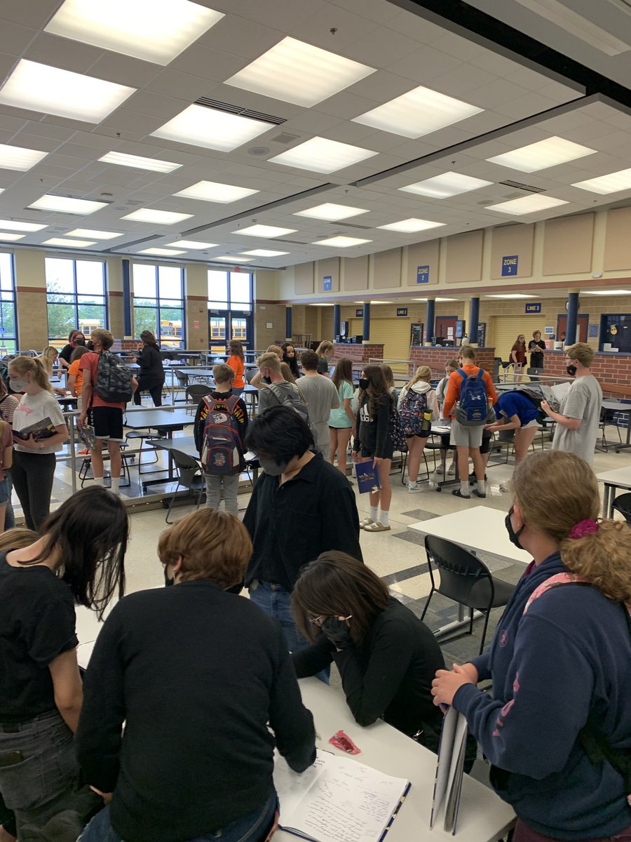It was the 8th graders’ turn to sign yearbooks.