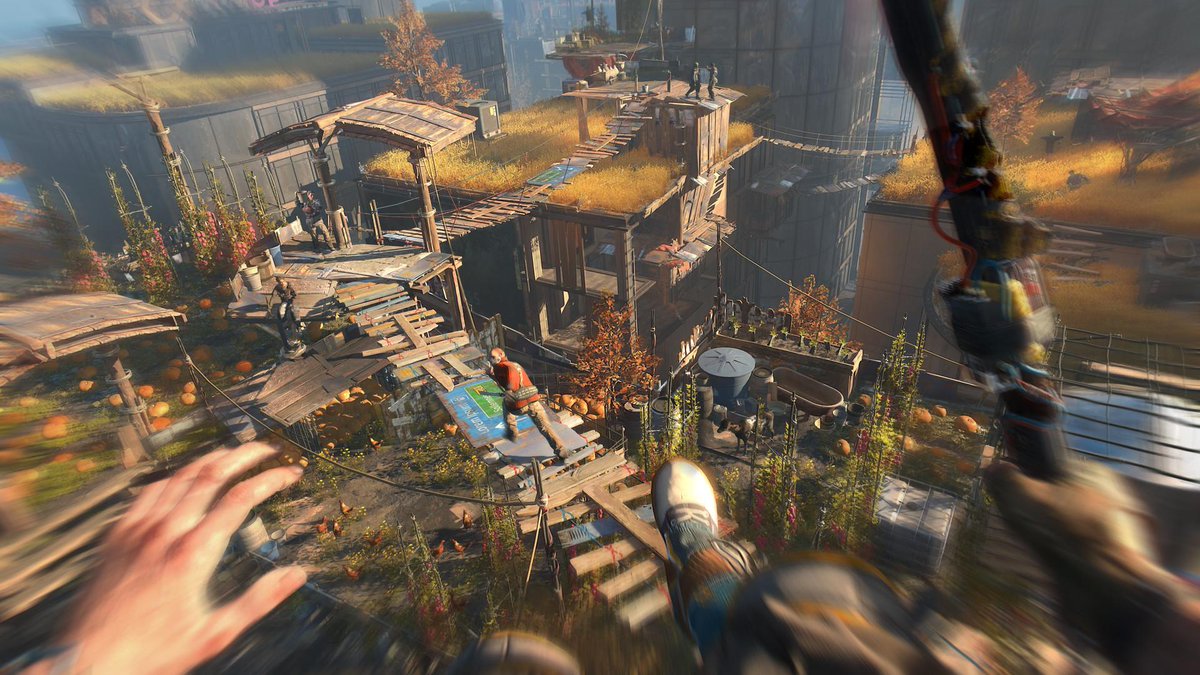PlayStation's tweet photo. Dying Light 2 Stay Human parkours onto PS5 and PS4 December 7. New gameplay includes grappling hook and paraglider. Details: https://t.co/Zafm4Mbcxy https://t.co/hN6k0buT53