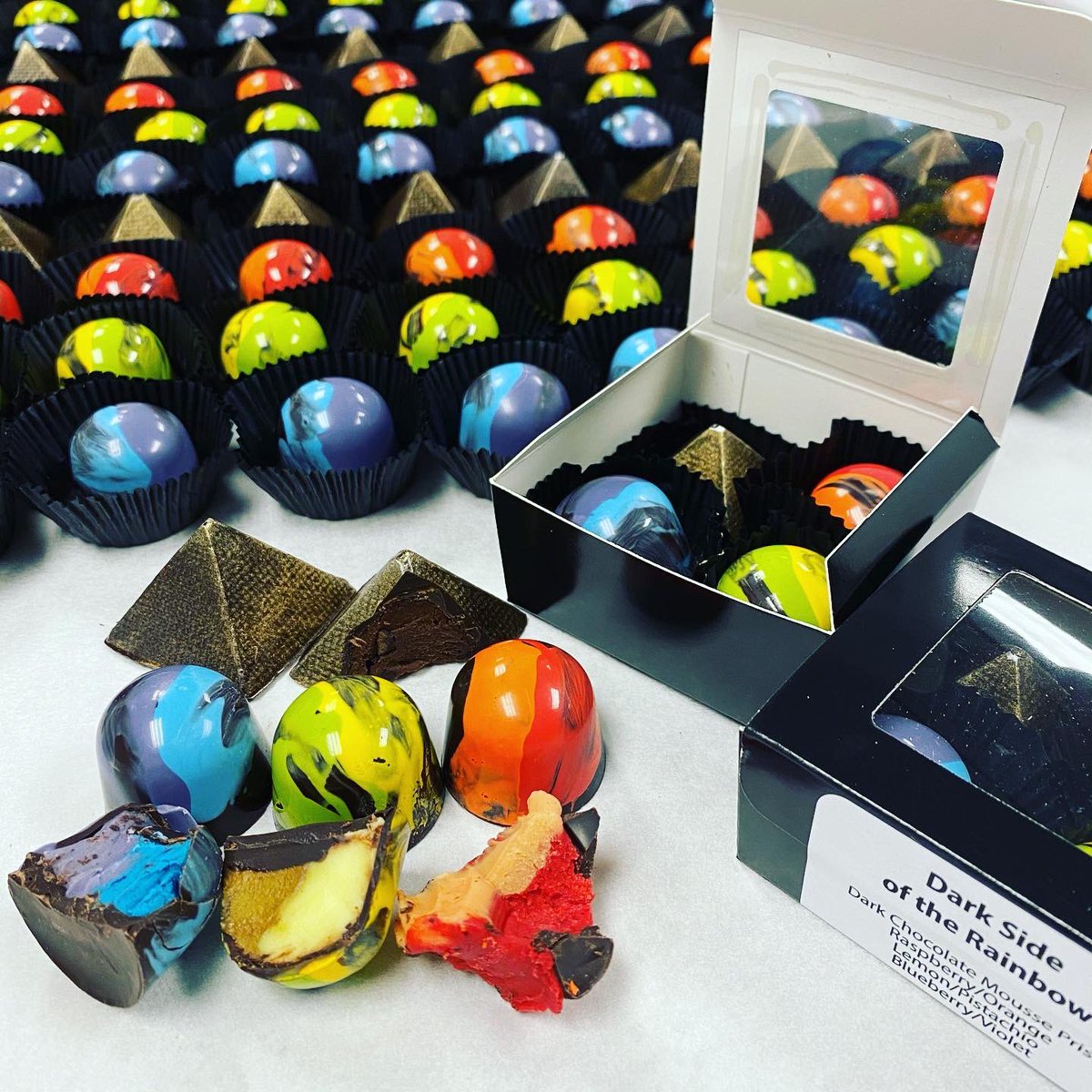 TeaseChocolates's tweet photo. Dark Side of the Rainbow:  Dark Chocolate Mousse, Raspberry/Orange, Lemon/Pistachio, Blueberry/Violet
In-store availability only. Limited Supply- noon - 6, Tues-Sat. #teasechocolates #chocolatemousse #raspberryorange #lemonpistachio #blueberryviolet  #darksideoftherainbow https://t.co/RlALHvwefE