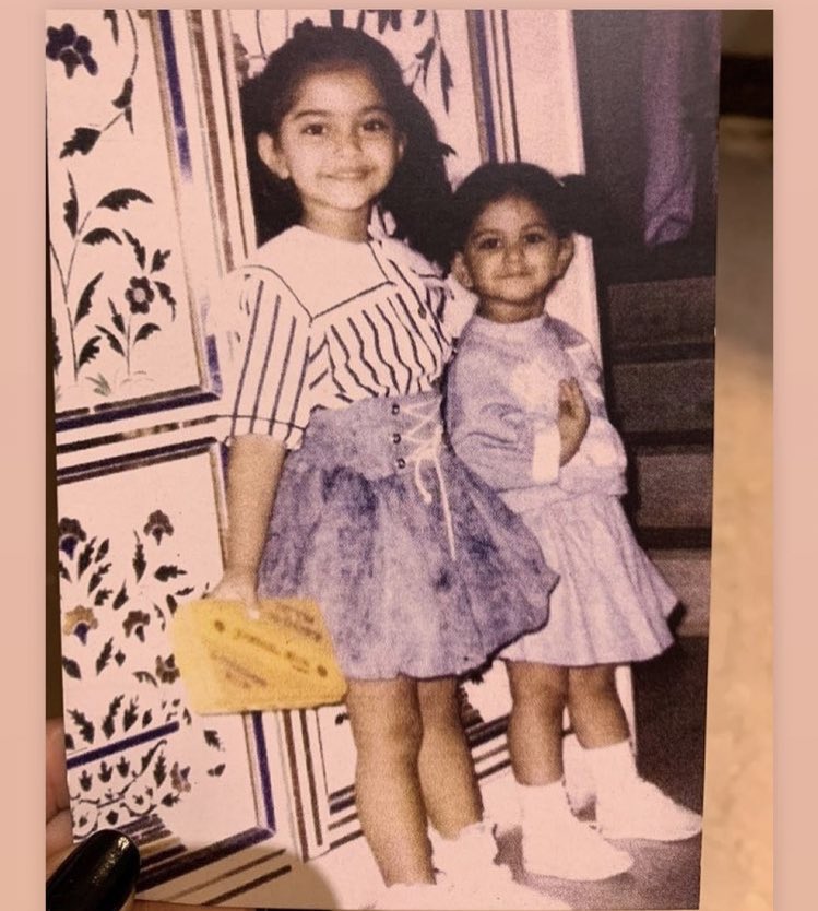 filmfare's tweet photo. Guess who is this adorable pair of sisters from Bollywood? https://t.co/lIMFliby0h