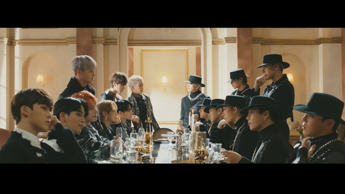 let's start with their MV referencesstarting with Answer! Ateez sits on the same table with fedora men to make a deal, the deal is "to turn into one of them"