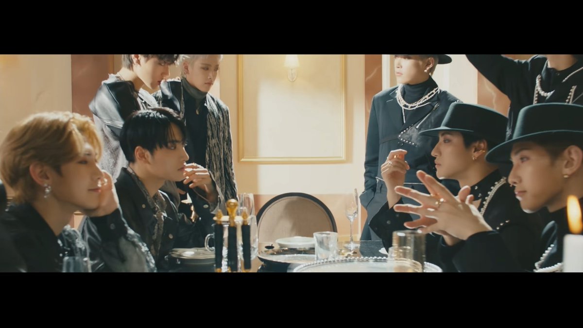 they are toasting BUT some of them don't drink, you can see that seonghwa's glass is the only one that is not empty, but remember that san is also pouring his drink in their choreography!