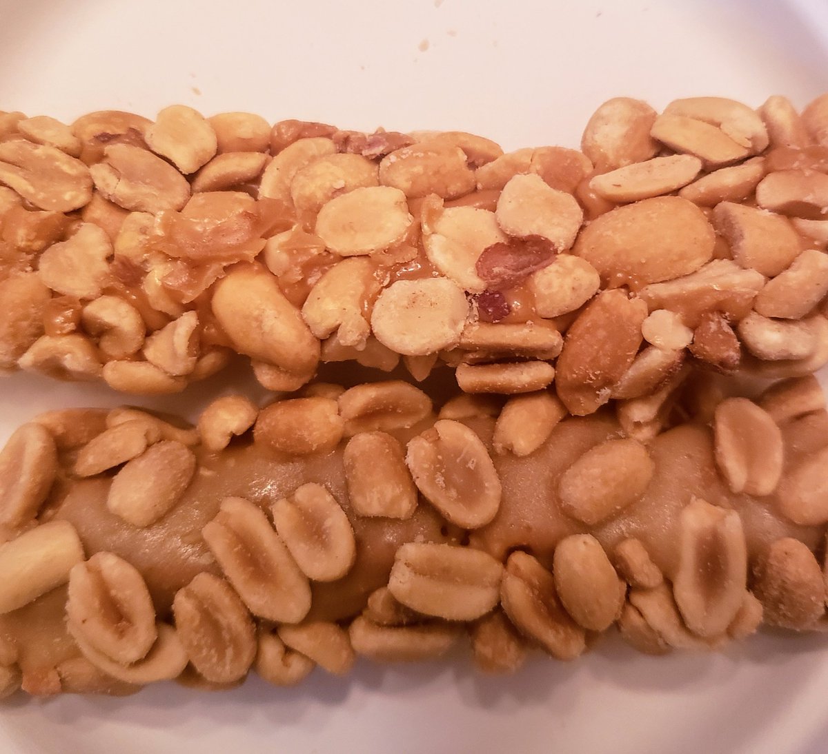 Food_Scientists's tweet photo. We compare Payday to the Salted Nut Roll candy bars. We find at least a couple of differences - nougat, peanut coverage,  size.  #fspod #food #reviews #comedy #candy 
https://t.co/DED7MAOVMg https://t.co/AMBnJz2Wpo