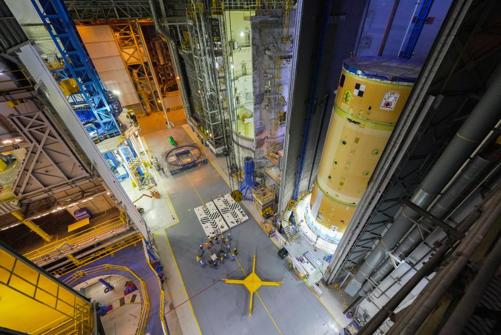 Teams from NASA and core stage prime contractor Boeing observe the connected forward skirt, liquid oxygen tank, and intertank flight hardware inside an assembly area at NASA’s Michoud Assembly Facility in New Orleans.