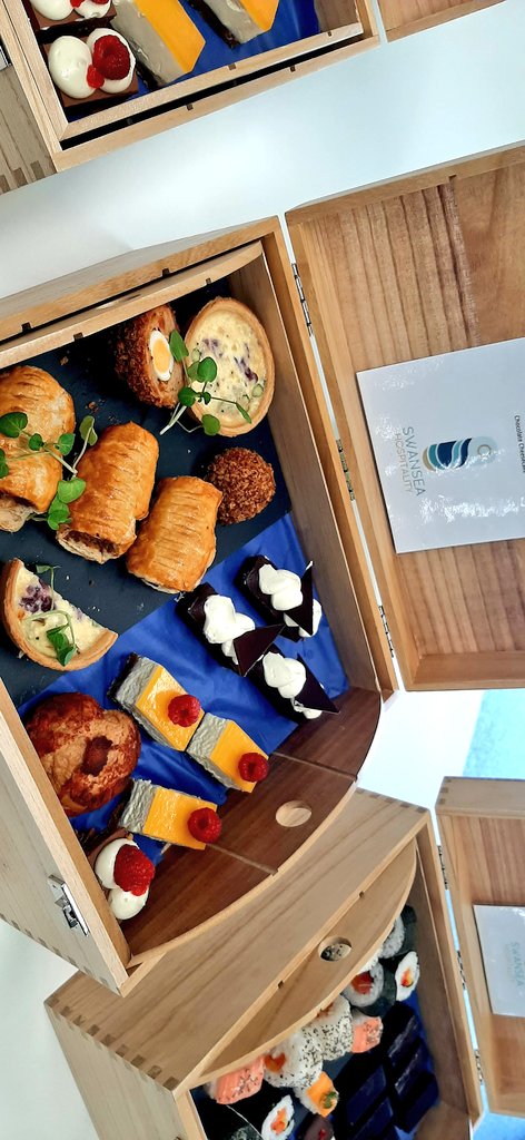ChrisPennycott's tweet image. A couple of our VIP lunch boxes today that included rosemary and fennel sausage rolls, vegan sushi, vegan fudge, vegan orange sponge and a rich Guinness and cream cheese cake plus much more.@sarahpastrychef @IndiesSodexo