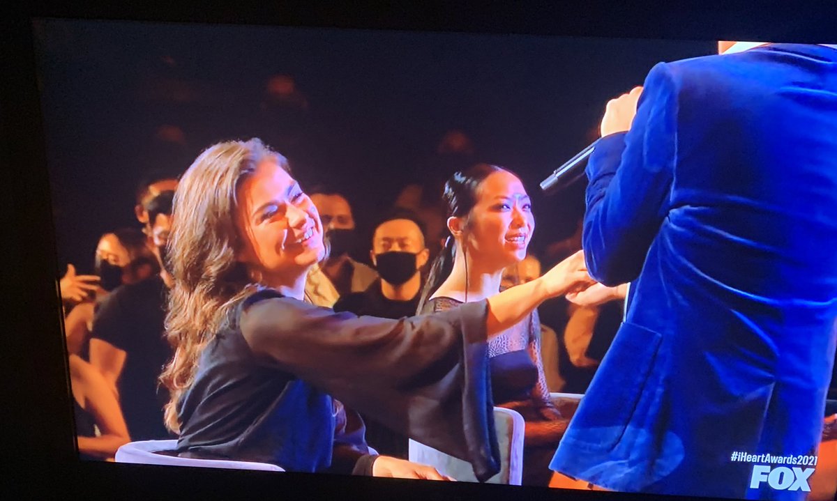 agbfalling's tweet image. Who is this girl and how do I get her job #iHeartAwards2021