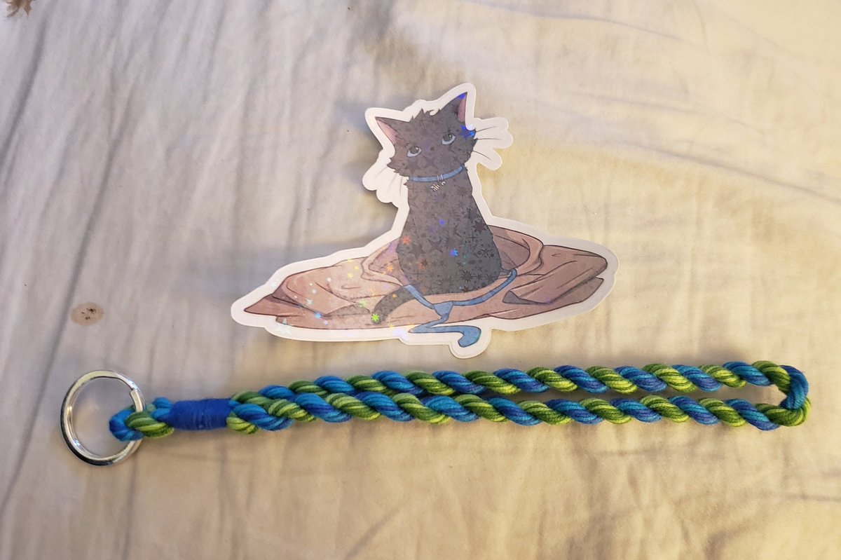 samikitten's tweet photo. Best mail day ever! Glitter Catstiel is going on my laptop and the Destiel keychain is going on my cane so it will literally go with me everywhere. Thanks @NP_Infiniteart and @iftheresakey!!! https://t.co/qbga3oMM95